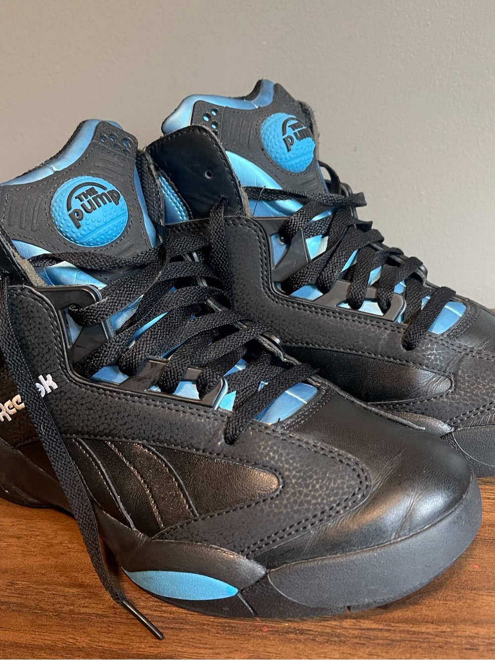Reebok High-Top Pump Sneakers in Black & Light Blue